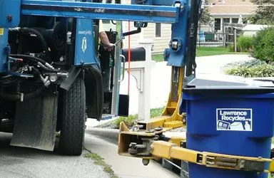 Solid Waste truck picking up recycling