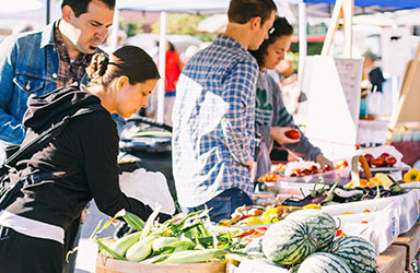 People shopping at Farmers Market