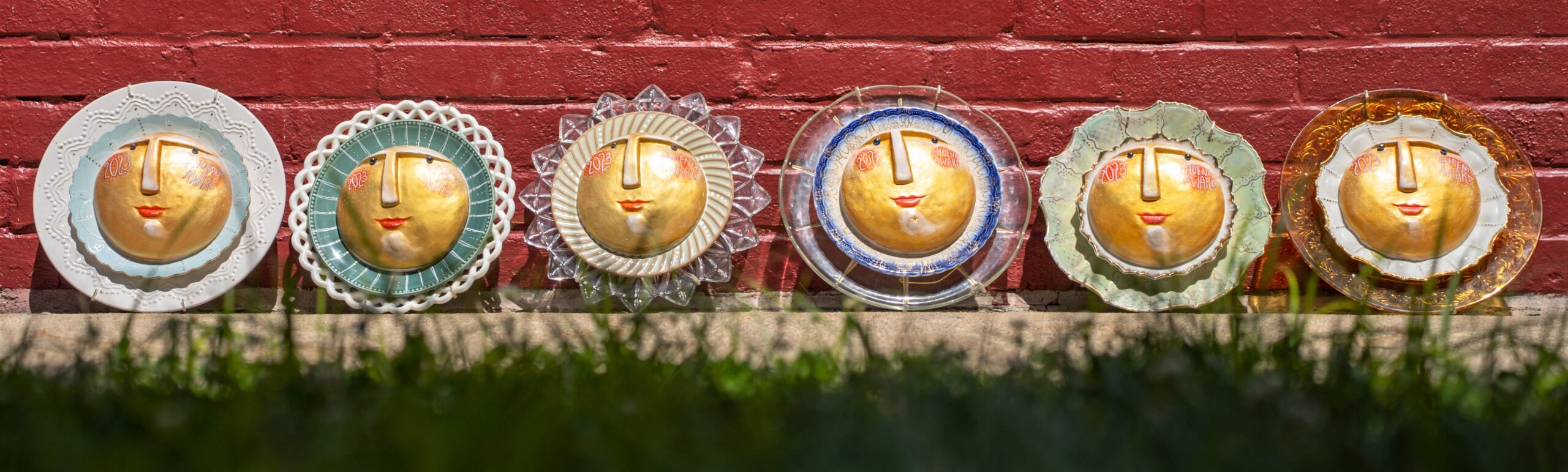 Photo of the six 2023 Phoenix Awards created by Toni Brou