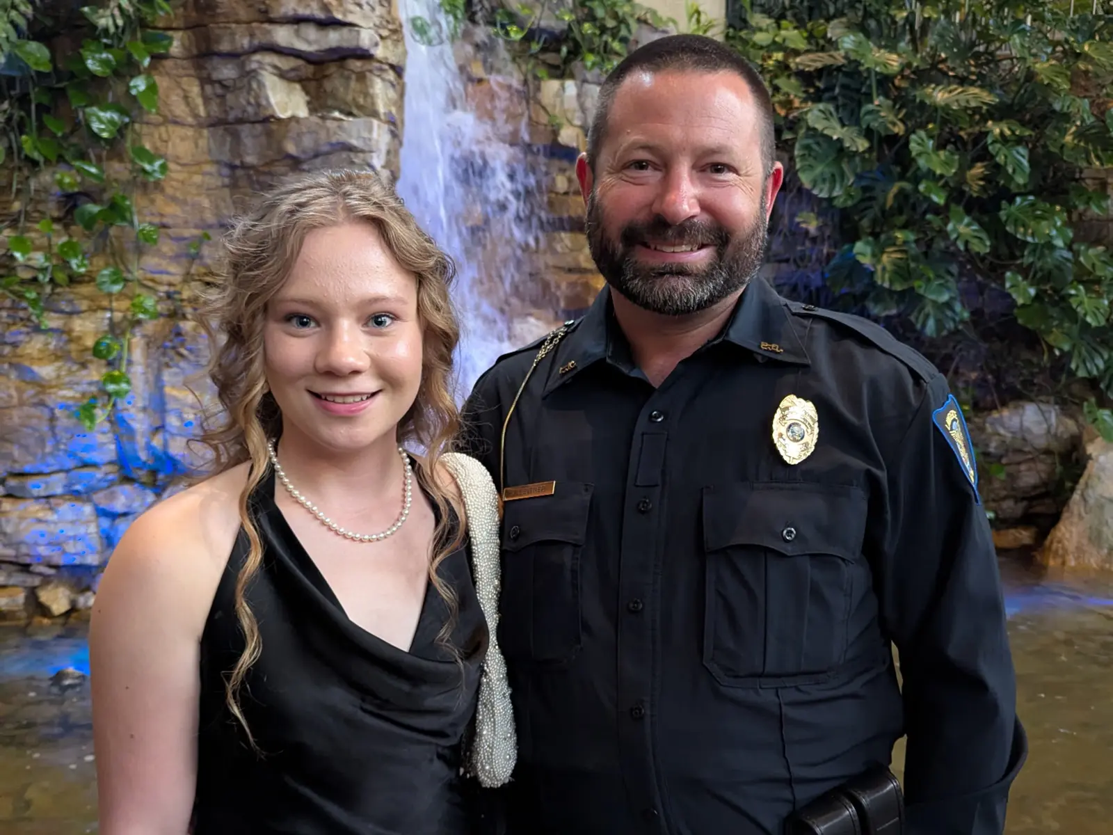 LKPD Detective Josh Leitner supports ShadowBuddies at the gala alongside his lifelong friend Mike Mosher's daughter, Tyler Mosher